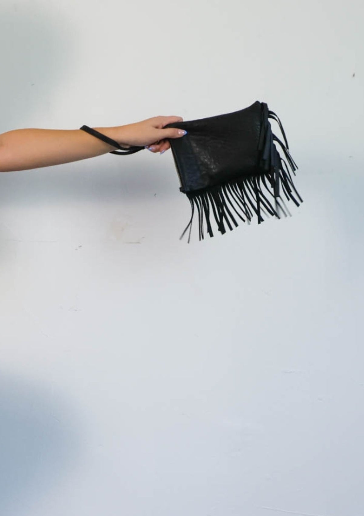 TANCA | Danijela tasseled leather pouch bag
